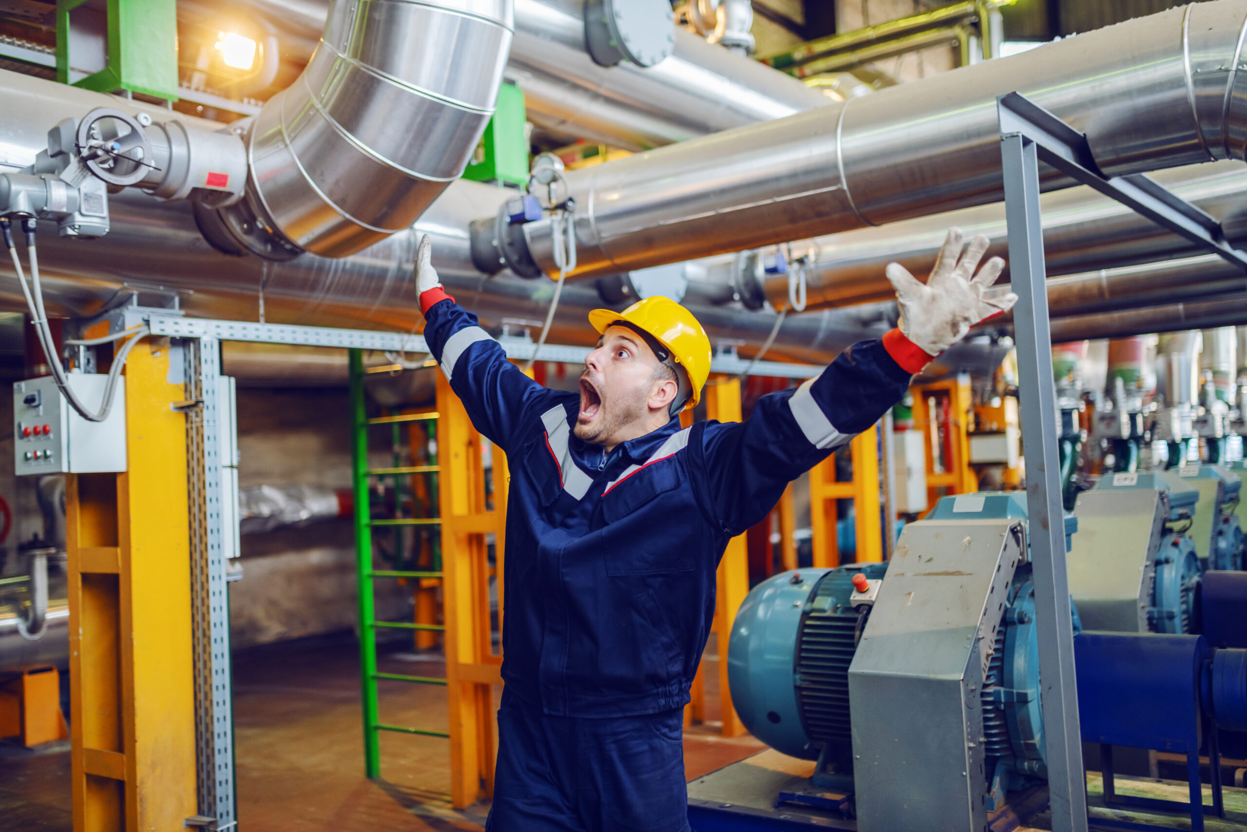 Caucasian worker in uniform made mistake and panicking for possi